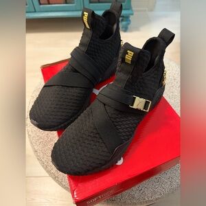 PUMA Black and Gold Athletic Shoes